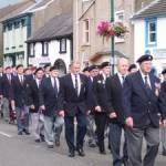Sunday 14 August 2005: VJ 60th Anniversary Veterans’ Parade, Main Street, Egremont, Cumbria.  Among those seen in the photograph: Joe Toner, Arthur Ibbotson, Frank Flynn, Roy Rogers, Billy Gribbin, Jack Farrell, Leo Smith, Joe Pooley, Jim Jolly, Ray Devlin.  [Photograph by Joseph Ritson]