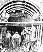 construction workers making sewers