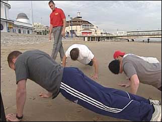 The recruits performing press-ups