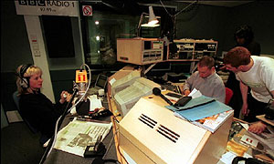 Kevin Greening (centre) in the Radio 1 studio with Zoe Ball
