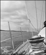 Looking out over the boat deck to yachts  in distance