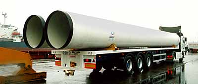 Huge water pipes delivered around the countryside by lorry