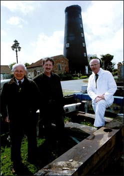 Three men and windmill 'cap' 352