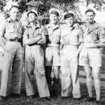 Reg Voller, (centre) and friends, after the landings were complete at Madagascar. Reg Voller, (centre) and friends, after the landings were complete at Madagascar.