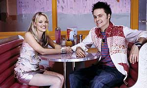 Laura Aikman as Mysti and Oliver Mason as Rick in The Mysti Show