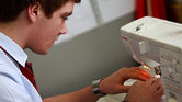 See kids, sewing... See kids, sewing...