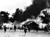 Photograph showing British and Indian troops in action