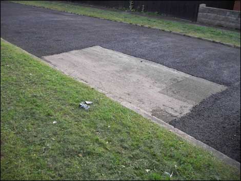 Gap in tarmac on a road in Tupsley