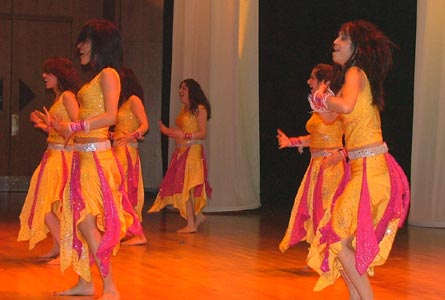 The Independence Dance Group swirl the stage in colour!