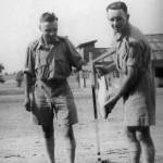 L to R  - Alan Shaw and Alec Scott just returned to Jhansi from our Saugor road reconnaissance, measuring a mahseer fish we caught by hand while fording the River Betwa causeway!  We just got across in time before the monsoon flood - June 1942