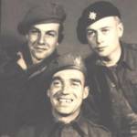 Seamus[Jimmy] Morris is here top right photographed for a newspaper upon liberation. With him are an American Airman in borrowed uniform and  another [unknown].