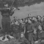 famous violinist and band leader Eugene Pini playing for his colleagues on 9th September 1941. My father is ringed. famous violinist and band leader Eugene Pini playing for his colleagues on 9th September 1941. My father is ringed.