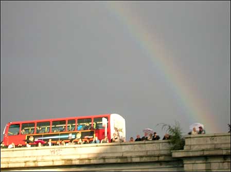 Procession and rainbow