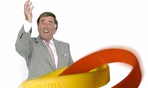 Terry Wogan with the new Children in Need wrist bands