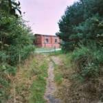 This tank track leads to what later became a primary school.  It closed in the early 1970s.