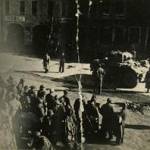A british armoured car belonging to A Squadron 5 troop 12th Royal Lancers (recce for the Second New Zealand Division). 600 Germans surrendered after Spitfires appeared. I can be seen on the right of the image with my hand held aloft. A british armoured car belonging to A Squadron 5 troop 12th Royal Lancers (recce for the Second New Zealand Division). 600 Germans surrendered after Spitfires appeared. I can be seen on the right of the image with my hand held aloft.