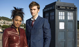 Freema Agyeman as Martha Jones and David Tennant as The Doctor in front of the Tardis