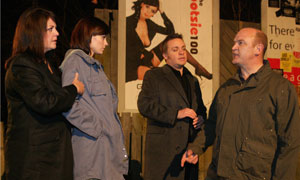 Pauline (Kathryn Hunt), Ashley (Sinead Moynihan), Murray (Lee Boardman) defend Ashley's near topless ad to an irate Terry (Connor McIntyre)