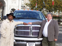 Winston McKenzie and Kevin Baird with vehicle