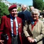 Sunday 26 June 2005: Ken and Joyce Patterson from Maryport at St Nicholas Church Gardens, Whitehaven.   Ken had just marched with fellow members of the Parachute Regiment Association in Cumbria’s official ‘Victory Parade’ commemorating the 60th Anniversary of the end of World War Two.  [Photograph by Joseph Ritson]