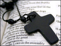 Cross on bible