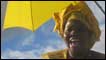 Woman in yellow party colours supporting the UDF in Malawi