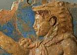 Terracotta plaque, depicting Apollo's struggle with Hercules for control of the sanctuary at Delphi