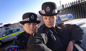 Rosie Cavaliero as PC Sally Frank and Michelle Gomez as PC Sally Bobbins
