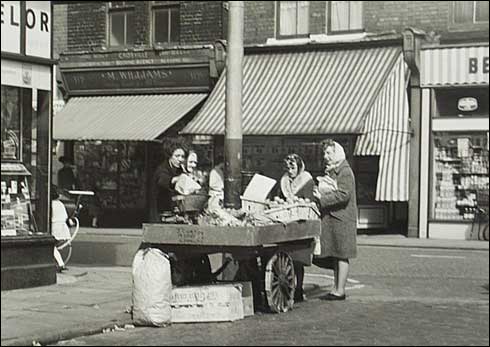 "Shilling a pound, ripe tomatoes" off Lodge Lane,l960