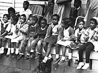 Children watching a black voting rights march in Alabama. Martin Luther King led the march from Slema, Alabama, to the state capital in Montgomery