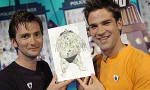 David Tennant and Blue Peter's Gethin Jones with the winning monster