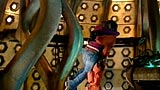 Rose is so happy to see the Doctor again and hugs him.