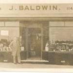 Father's shop on Rodway Road, in Patchway, Bristol,  which sold groceries, confectioneries and was a tobacconist, as it would have appeared throughout its war years, except that during the blitz period it had folding wooden shutters as protection against flying debris.