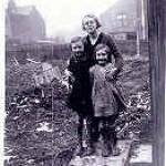 Barbara with her mother and sister in their garden, the morning after the bombing. Barbara with her mother and sister in their garden, the morning after the bombing.