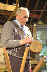 Davey marking the nave of the cart wheel