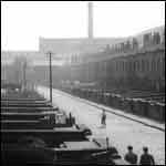 Bradford street scene with backyards and factory in background