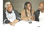 Producer Bola Olufunwa in discussion with Professor Ali Mazrui (left) and Dr Wosene Yefru (right)