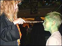 Picture: Girl dressed as Hermione with a boy dressed as an alien