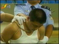 Prisioneiro chinês em execução pública