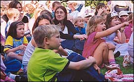 Picture: children watching outdoor theatre