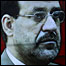 Cartaz com a imagem de Nouri Maliki