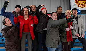 The Cup: Picture shows back row L-R: Fourbellies (CRAIG CUNNINGHAM), Mercier (EMMANUEL LECONTE), Janice McConnell (JENNIFER HENNESSY), Dr Kaskar (PAL ARON) & Steve Robson (BILLY GERAGHTY). Front row L-R; Vincent Farrell (DOMINIC COLEMAN), Sandra Farrell (TANYA FRANKS), Terry McConnell (STEVE EDGE) & Debbie Rossi (SAMANTHA POWER). © Hartswood Films/Matt Squire 