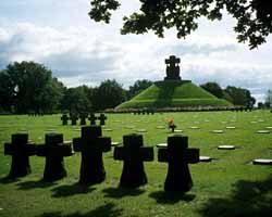 Only a couple of miles away the German cemetary, with its black granite crosses and mourning figures. 20,000 Germans are buried here