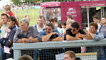 The crowd enjoy listening to Roy Noble on air.