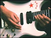 Guitar being played