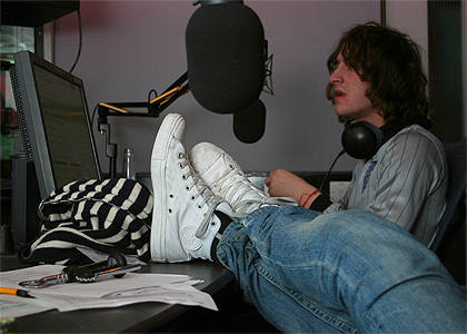 Kieran kicks back. Hmmm.. those jeans look familar. Hey, weren't they the same ones as.... oh, nevermind.
