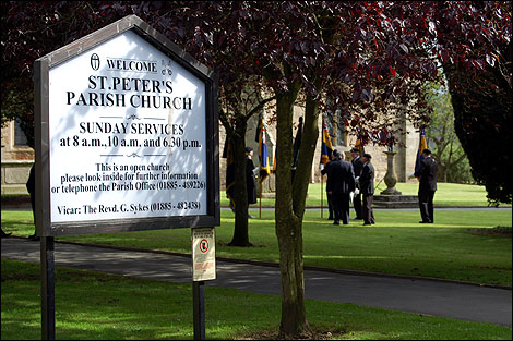 St Peter's Church, Bromyard, with members of the Royal British Legion in the background
