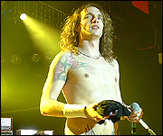 Picture: Justin Hawkins with is top off.