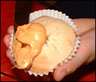 Picture: Spread the orange icing on to the cakes