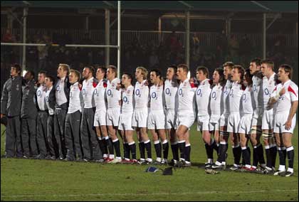 The England squad sing the National Anthem